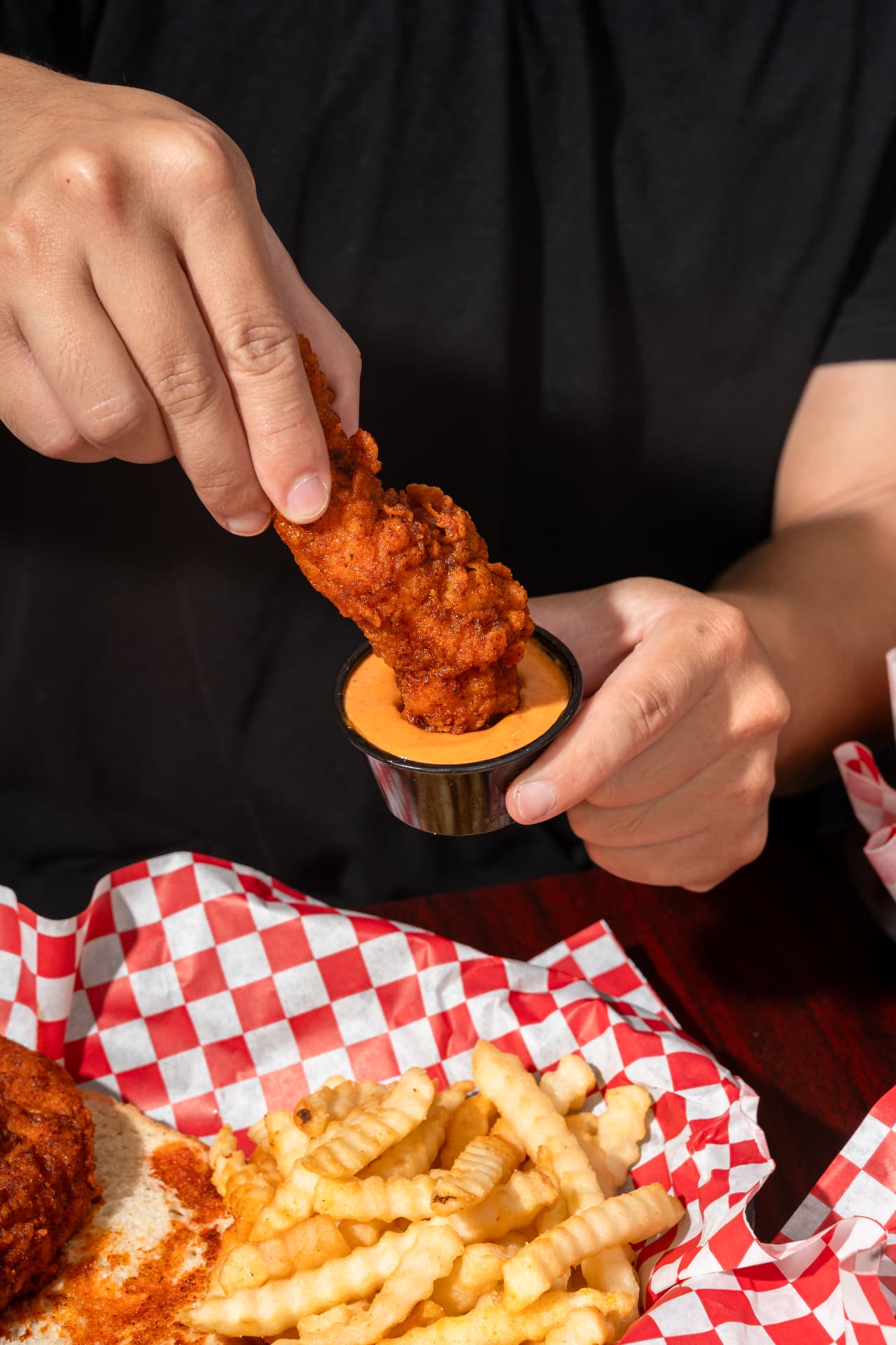 Bold Birds jumbo hand-breaded chicken tenders with bread and pickles