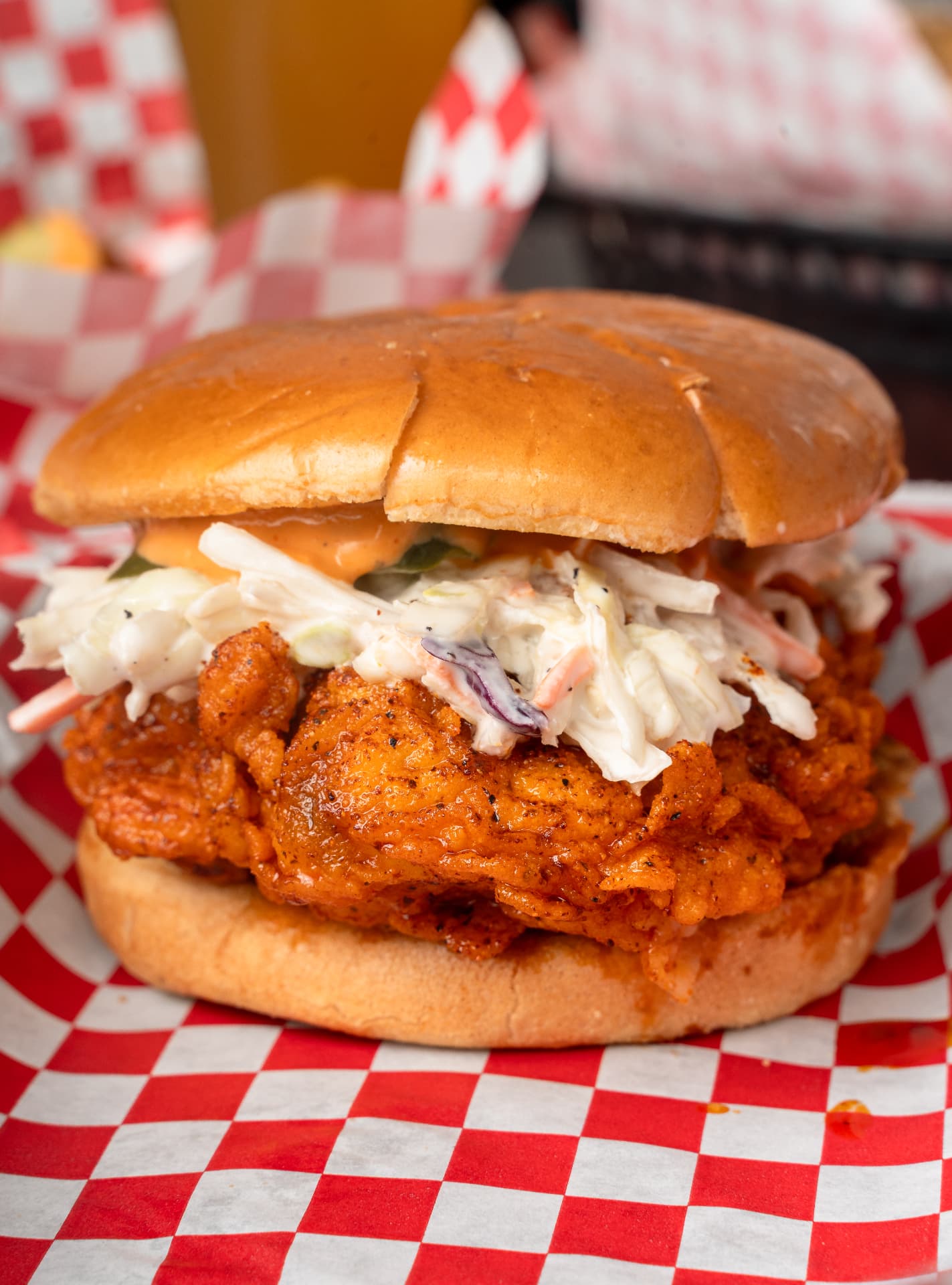 Hughes' Hot Chicken Sandwich — crispy hand-breaded chicken with pickles